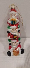 Macy's Cheerful  3 Santa's Jumping for Joy Christmas is Here Ornament