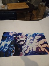large anime-themed desk mat or mouse pad