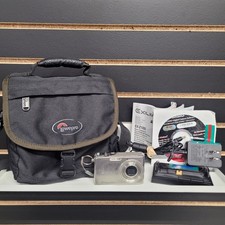 Casio EXILIM EX-Z1000 10.1 MP Digital Camera, Charger, Case & Instructions WORKS