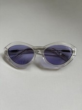 Quay Australia As If Sunglasess- Clear cat-eye frame and purple lenses.