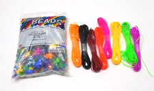 Assorted Plastic Beads Shells Fish Dogs with Plastic Lacing Cords Lot Crafts