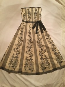 cream dress with black lace overlay