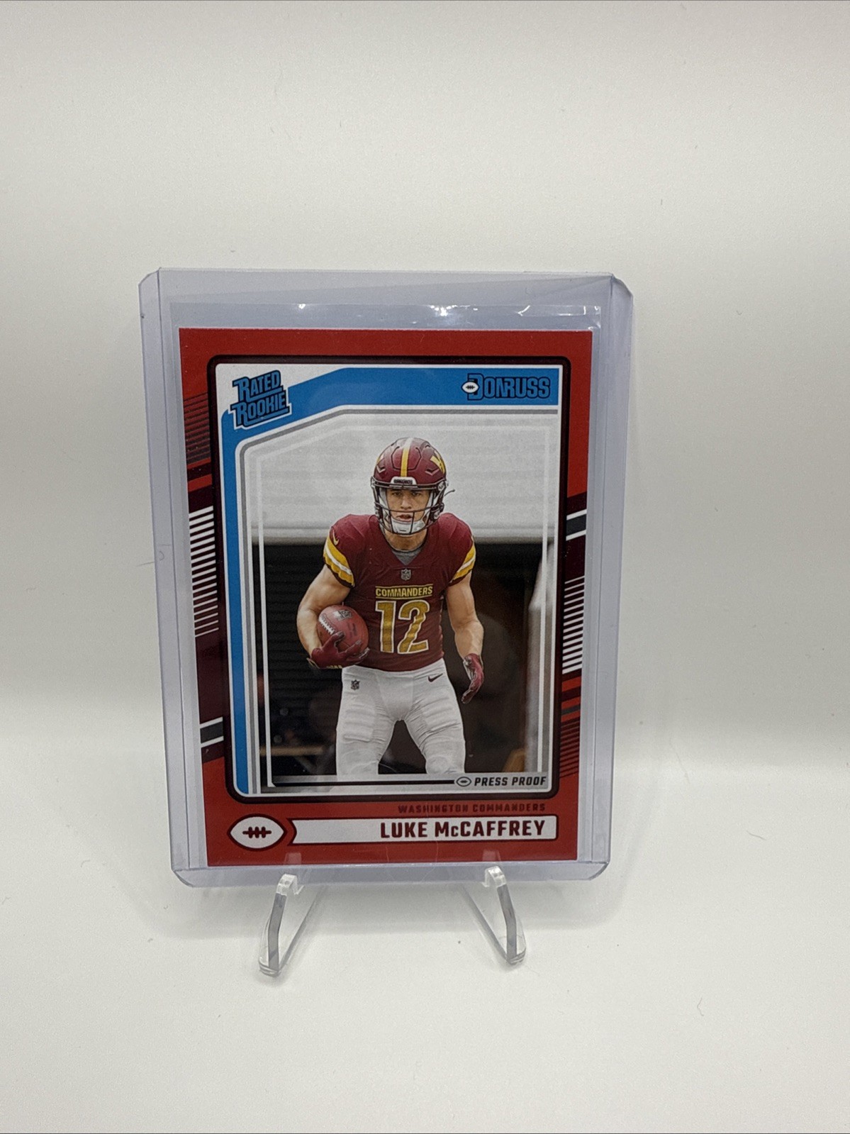 2024 Panini Donruss - Rated Rookie Luke McCaffrey #302 Press Proof Red (RC)