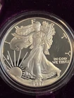 1987s SILVER EAGLE UNC PROOF US MINT  MANY PHOTOS COME SEE.
