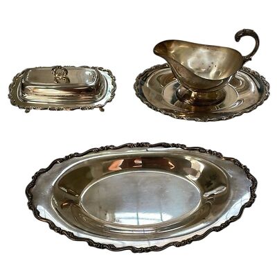 William A Rogers set of silver-plated gravy boat, butter dish, & platter.