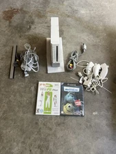Nintendo Wii White Console w/cables, Games, Stand. Works Tested.