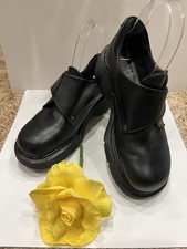 Vintage Dr. Martens Mary Jane platform shoes in black leather. Made in England.