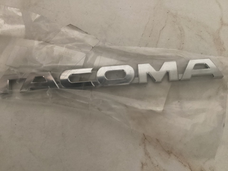 2005 Toyota Tacoma Genuine Toyota Tailgate Emblem (Rear) 75471