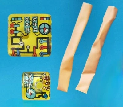 Bionic man Six Million Dollar Man Arm Chips Pair. Small & Large with 2 arm skins