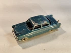 Matchbox Lesney no. 33 Ford Zodiac in dark green. Made in England about 1958.