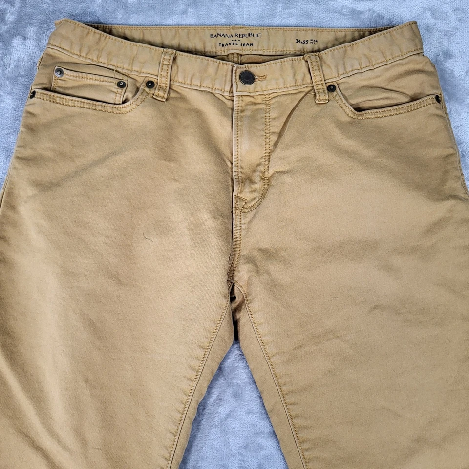 Pantalones de jean de viaje Banana Republic para hombre 34x32 (se adapta a 34x30) ajustados elásticos mostaza Foto 2 de 4