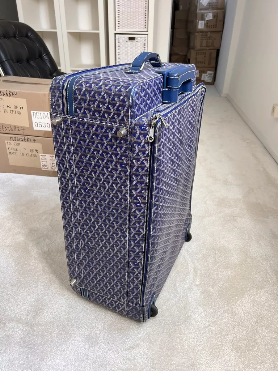 luggage trolley goyard travel