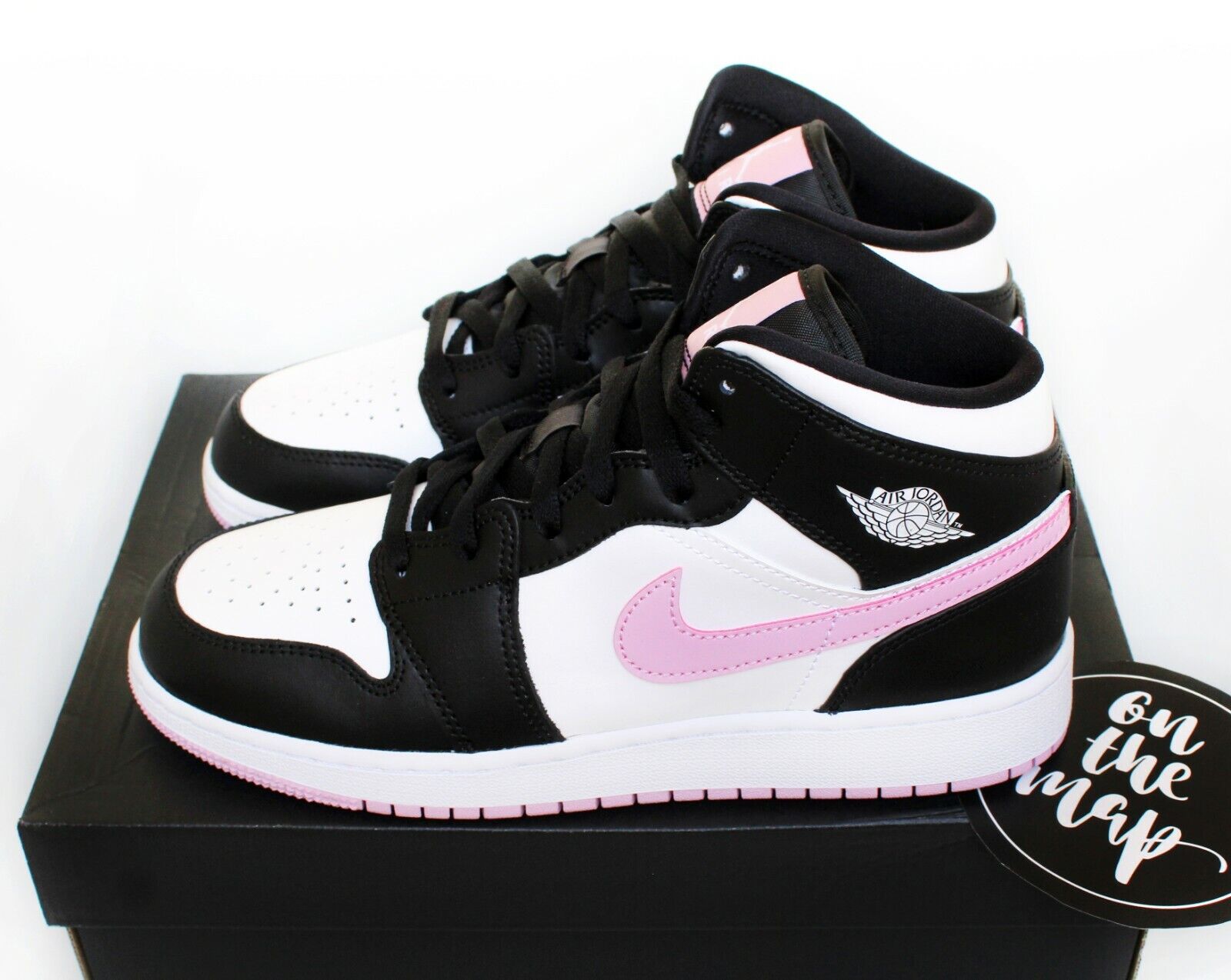 black and arctic pink jordans