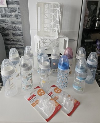12 NUK First Choice Babyflaschen 300ml mit 2 Flaschenkörben und 12 Trinksaugern