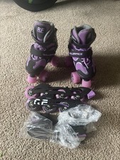 Girls Purple And Black Roller Skates With Additional Attachments