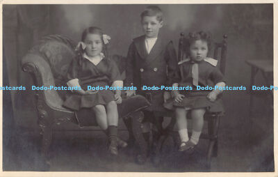 R178646 A Young boy and two girls. J. Alston and Son. Postcard