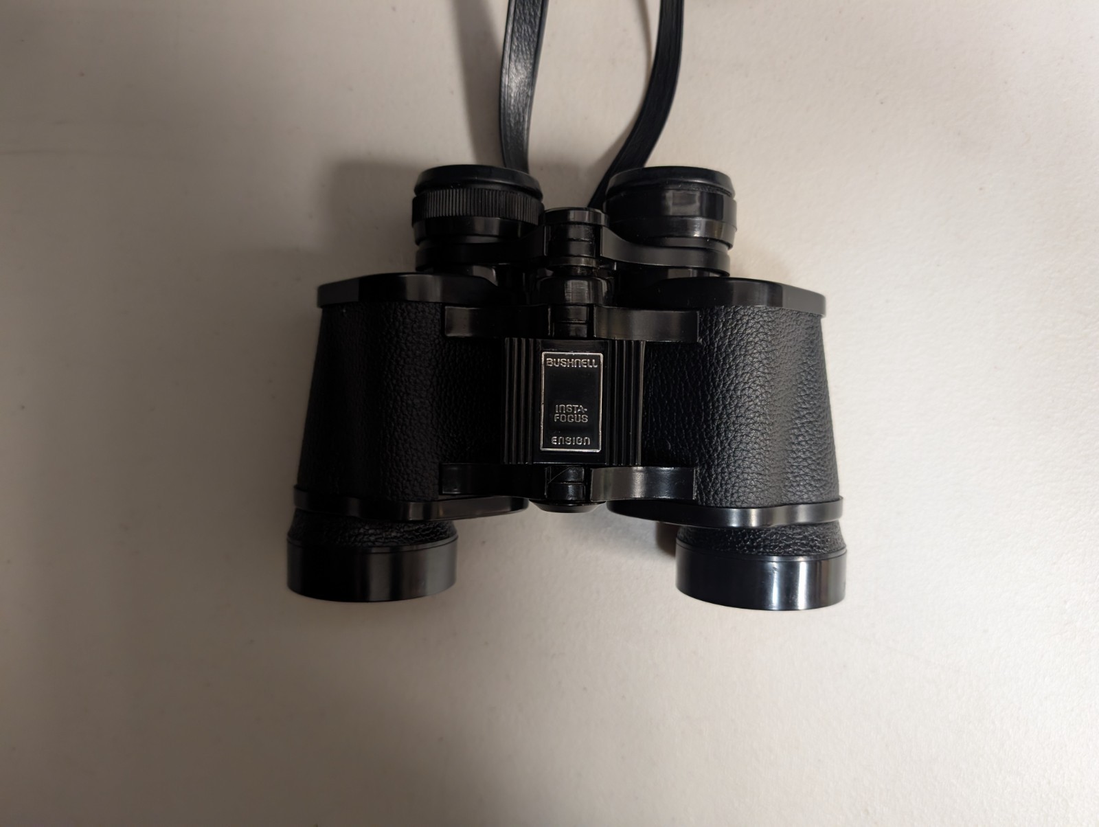 как выглядит Bushnell Binoculars Ensign Insta-Focus 7x35 Wide Angle 500 ft 1000 yd Case фото