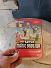 New ListingNintendo New Super Mario Bros. Wii Complete With Manual - Very Good Condition
