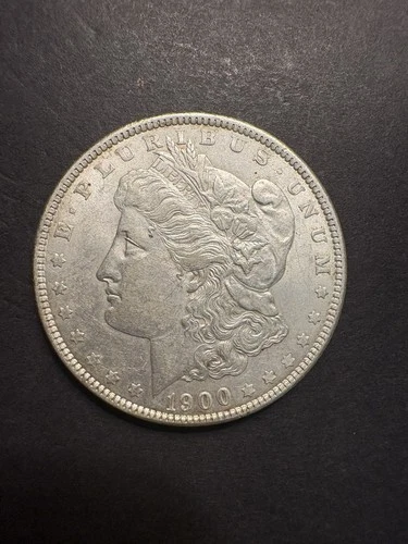 AU+ 1900 (P) Morgan Silver Dollar