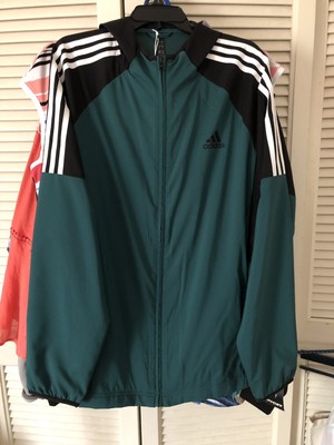 white adidas jacket with green stripe
