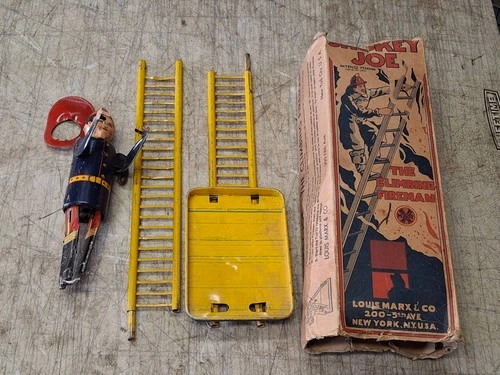 Vintage Marx Smokey Joe Wind up Tin Toy “The Climbing Fireman” Working w/ Box