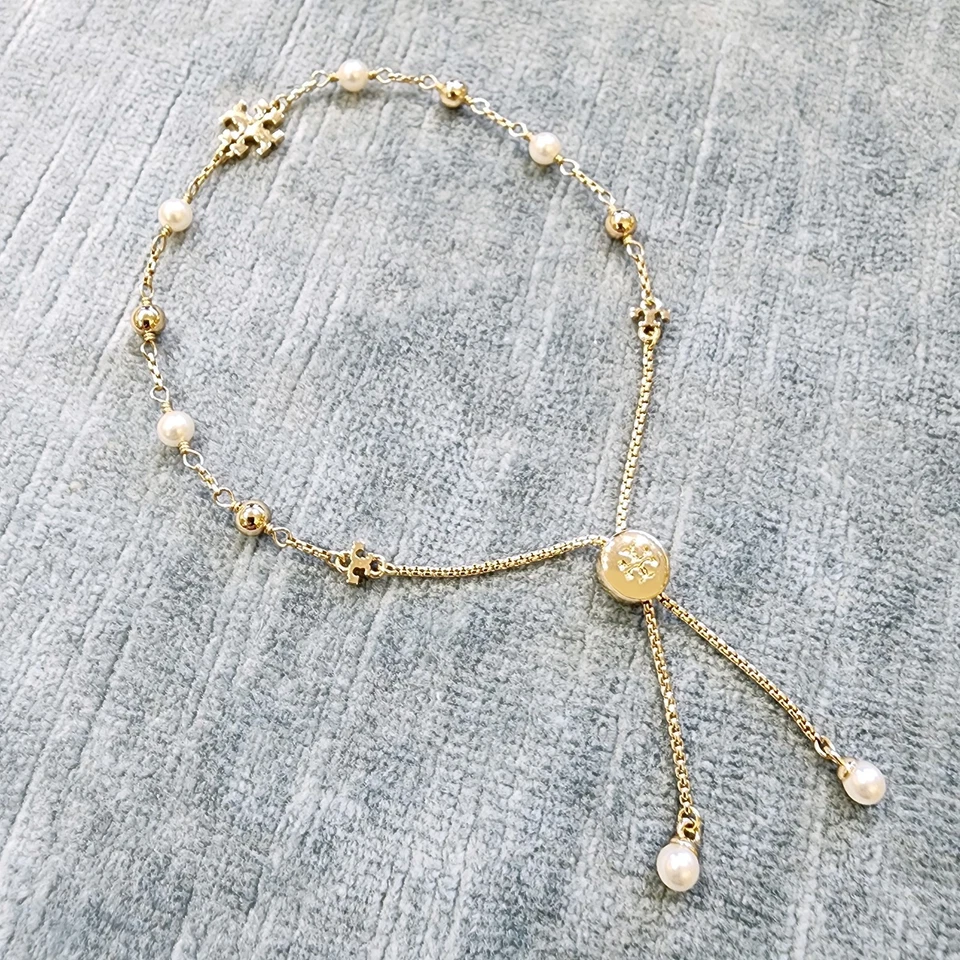 Authentic Tory Burch 18K Gold Plated Logo Pearl Beaded Slider Bracelet 164147 - Image 3 of 4