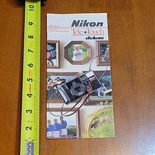 1987 BROCHURE NIKON TELE TOUCH CAMERA 35 70 MM RELEASE RARE