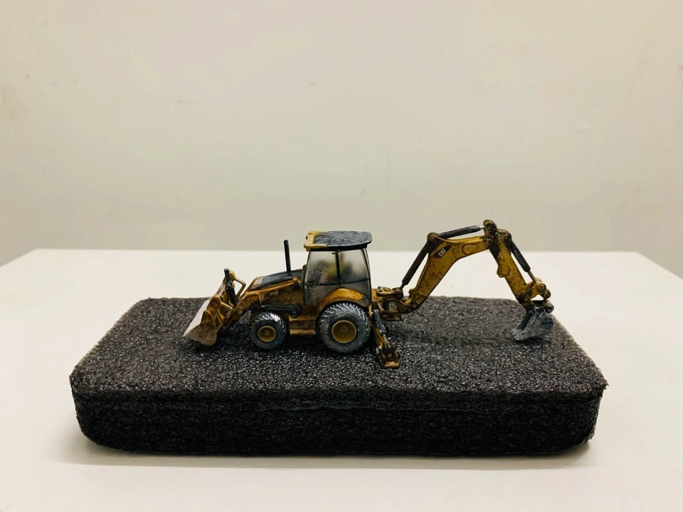 Cat 450E Backhoe Loader Muddy Edition 1:87 Ho Scale By Diecast Masters 85263 New - Image 3 of 4