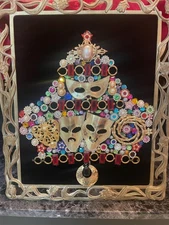 costume jewelry framed christmas  art W/ signed METAL "tragic drama" pieces