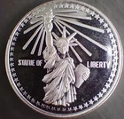 1986 I Lift My Lamp Statue of Liberty Silver Round 1 Troy Ounce