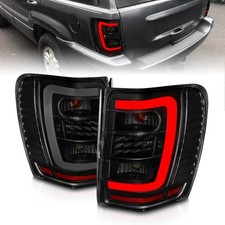 Anzo For 1999-2004 Jeep Grand Cherokee Led Tail Lights W Light Bar Black Anzo For 1999-2004 Jeep Grand Cherokee Led Tail Lights W Light Bar Black