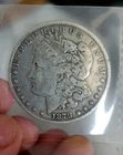 1878 Morgan Silver Dollar - 7 Tail Feathers in very good condition