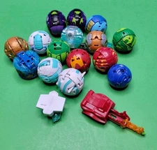 Lot Of 14 Bakugan Battle Brawlers & 2 Magnet Openers.