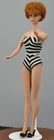 Vintage Titian Barbie doll with seven iconic outfits
