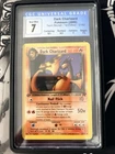 Pokemon 2000  Dark Charizard Non-Holo  21/82 1ST EDITION Team Rocket CGC 7 NM