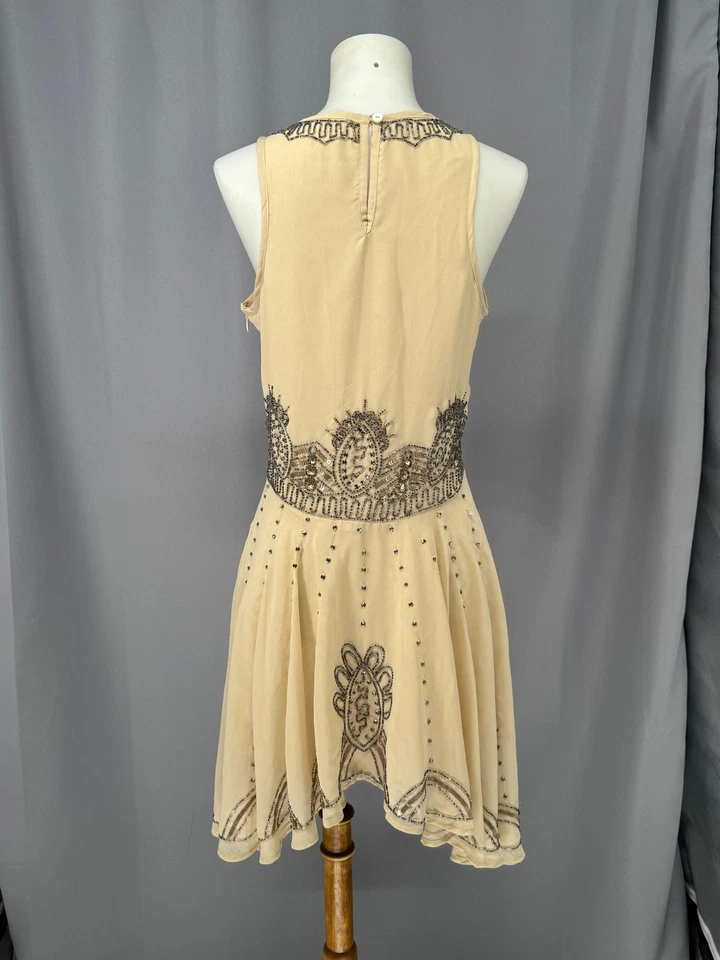 Vestido corto de fiesta Gatsby Art Deco con cuentas con solapa para mujer pequeño lentejuelas crema años 20 Foto 3 de 4
