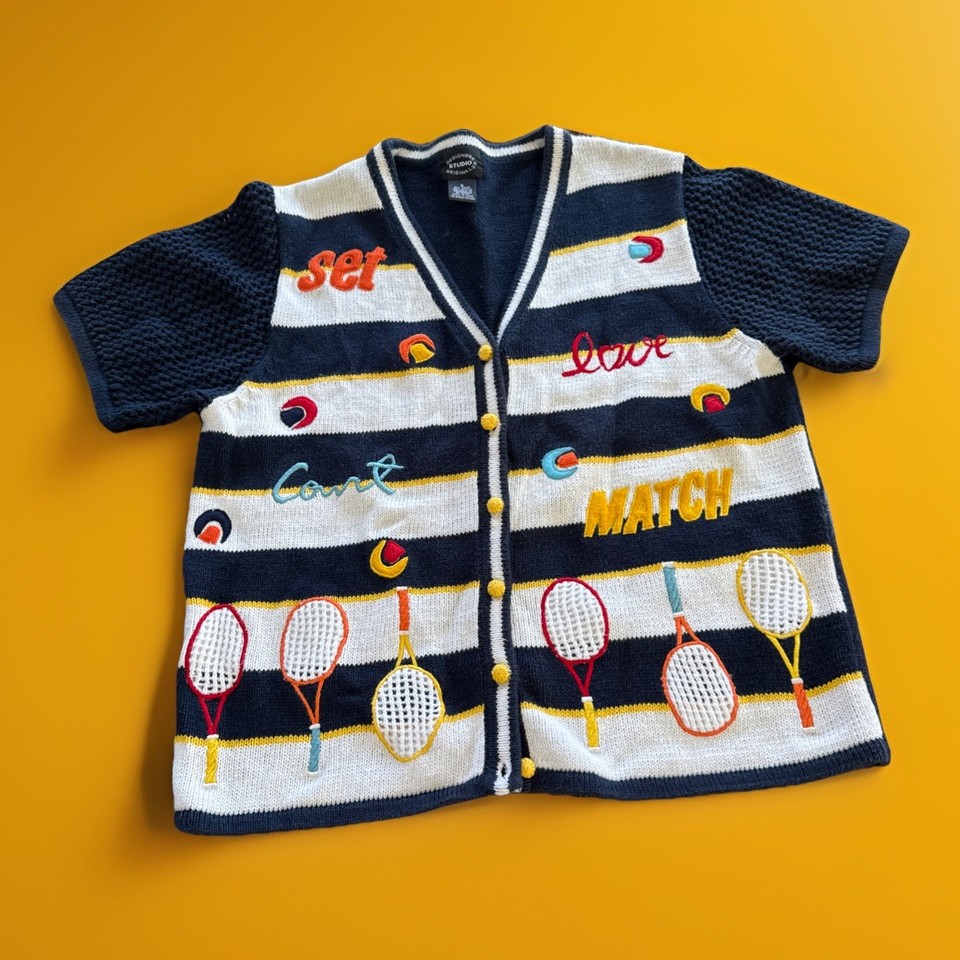 A genuine vintage cotton tennis cardigan with sporty knit detailing — the kind of preppy retro piece that looks like it escaped a 1970s Wimbledon crowd.