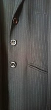 Tailleur donna pantalone. Completo gessato .Giacca con spacco dietro 
