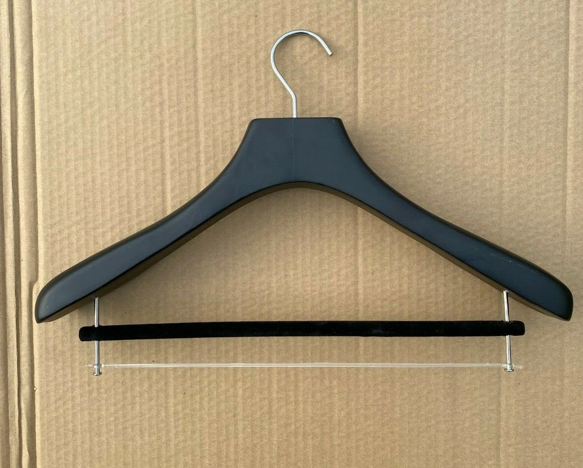 Black wooden store coat hangers