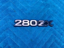 Datsun 280ZX Front Fender Nameplate RH or LH 1979-1983 OEM
