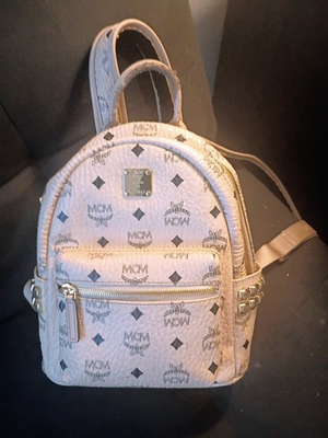 #ad MCM backpack is brand vintage bag tan leather. serial number front of bag . $259.99
