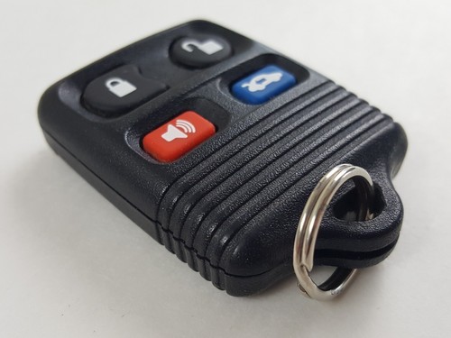 ORIGINAL MERCURY 99-09 OEM KEY LESS ENTRY REMOTE TRANSMITTER ALARM FOB 4-BUTTON - Picture 2 of 12