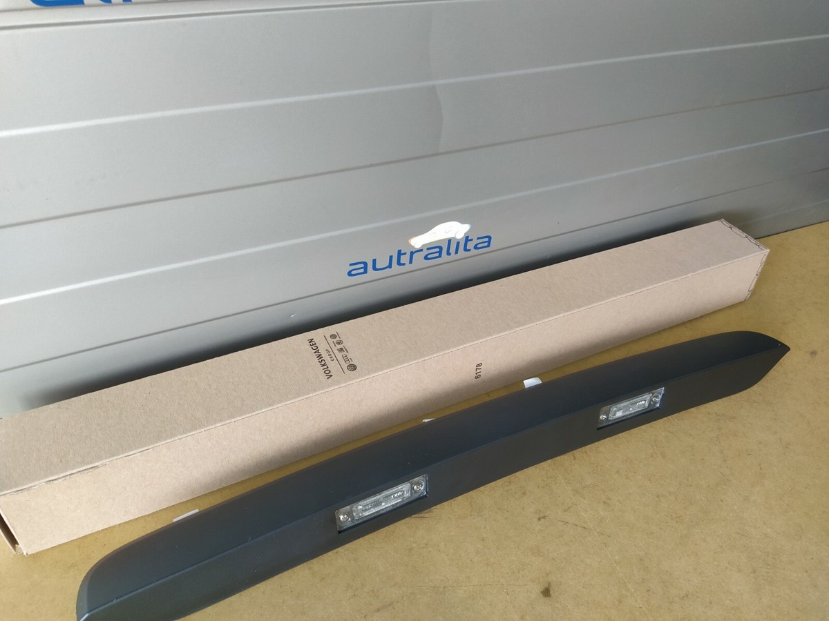 NEW Genuine OEM VW CADDY GRIP MOLDING, LICENSE PLATE LIGHT  