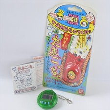 LCD TAMAGOTCH Clear Green Handheld Game Console Boxed 3101 Bandai Tamagocchi