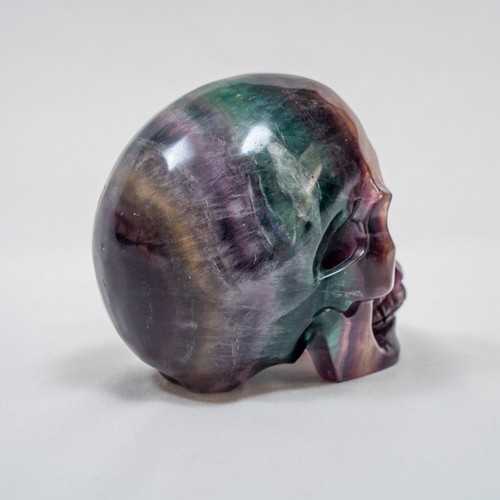 High Quality Rainbow Fluorite Crystal Skull w/ Imperfections - Hand Carved 4.25" - Picture 5 of 9