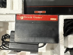 The Sega Base Master System with Box & Accessories