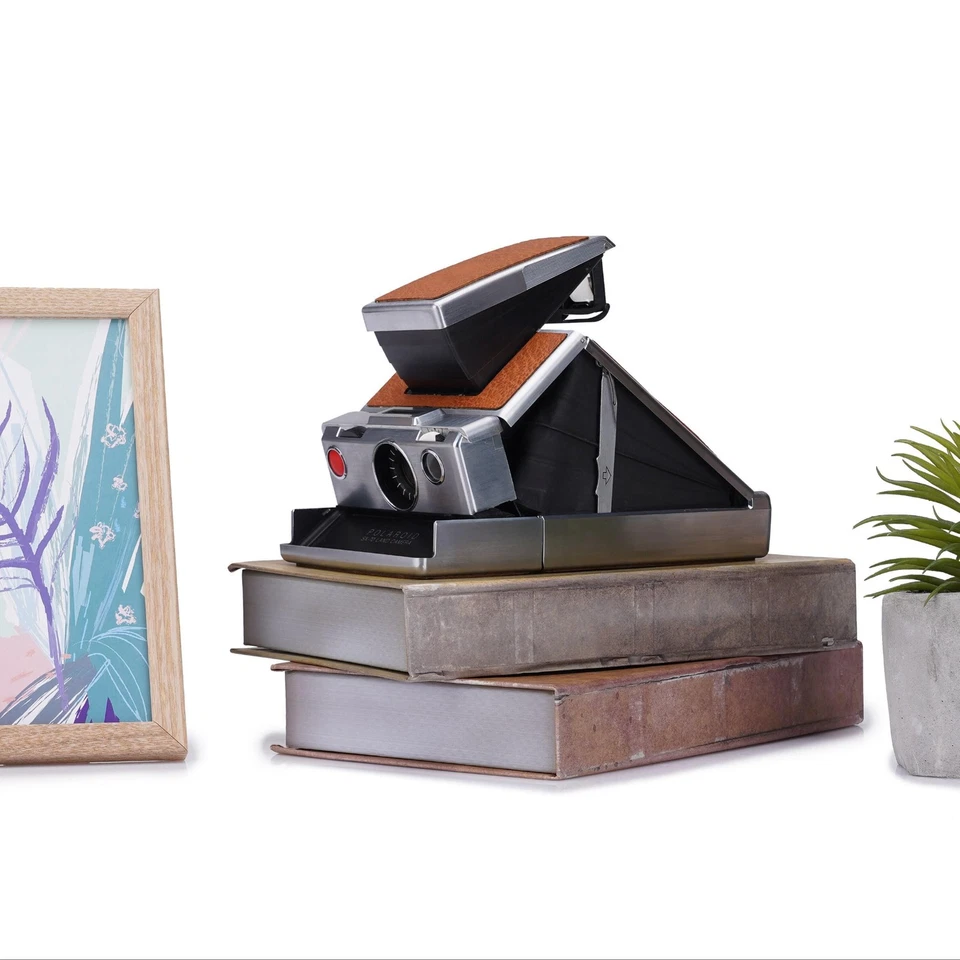 Cámara instantánea vintage Polaroid SX-70 - SLR clásica restaurada con manual Foto 2 de 4