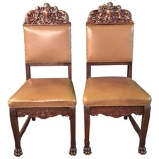 Two Antique Neo Renaissance Oak Chairs from the 19th Century Hand Carved