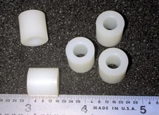 NYLON SPACERS  1/2"  ROUND  1/4"  HOLE  1/2" LONG  - 25 pcs