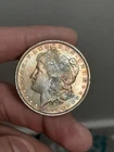 1884- O Morgan Silver Dollar BU Toned (Damage)